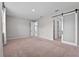 Large bedroom with barn door to bathroom and ample space at 1717 Hilltop Dr, Dundee, FL 33838