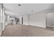 Expansive living area with recessed lighting and hardwood floors at 1717 Hilltop Dr, Dundee, FL 33838