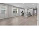 Open-concept living area with modern kitchen and abundant natural light at 1717 Hilltop Dr, Dundee, FL 33838