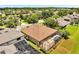 Aerial view of a backyard with a screened-in pool and lush green landscaping at 1902 Tumblewater Blvd, Ocoee, FL 34761
