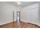 Bedroom with hardwood floors, closet and en-suite bathroom at 1902 Tumblewater Blvd, Ocoee, FL 34761
