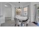 Cozy dining area with modern chandelier and bright, natural light at 1902 Tumblewater Blvd, Ocoee, FL 34761
