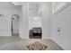 Elegant foyer with tile flooring, a decorative medallion, and a view into the formal dining room at 1902 Tumblewater Blvd, Ocoee, FL 34761