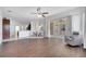 Large living space has hardwood floors and seamless flow to dining and kitchen at 1902 Tumblewater Blvd, Ocoee, FL 34761