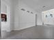 Open living area with modern recessed lighting and adjacent access to the kitchen at 1902 Tumblewater Blvd, Ocoee, FL 34761