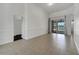 Open-concept living area with access to the pool area through sliding glass doors at 1902 Tumblewater Blvd, Ocoee, FL 34761
