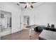 View of the office with hardwood floors and access to the bathroom and other rooms at 1902 Tumblewater Blvd, Ocoee, FL 34761