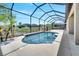 Private screened pool area for swimming laps or relaxing in the sun within lush landscaping at 1902 Tumblewater Blvd, Ocoee, FL 34761