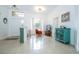 Bright living room boasting tile floors, natural light, and stylish furnishings at 2547 Raccoon Run Ln, Orlando, FL 32837