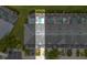 Aerial view of back of property with a private pool and enclosed patio at 2550 Renshaw St, Kissimmee, FL 34747