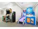 The game room boasts classic arcade machines, offering a fun experience for all at 2550 Renshaw St, Kissimmee, FL 34747
