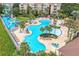 Aerial view of a community waterpark with slides, a pool, and splash pad at 2550 Renshaw St, Kissimmee, FL 34747