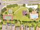 Aerial view of community amenities with pool, playground and tennis and basketball courts near residences at 2810 Maguire Dr, Kissimmee, FL 34741