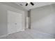 Spacious bedroom featuring double closets and neutral tile flooring at 2810 Maguire Dr, Kissimmee, FL 34741