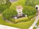 Landscaped entrance to Cypress Reserve community at 2810 Maguire Dr, Kissimmee, FL 34741