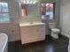 Bathroom with a vanity, toilet and windows at 283 Pine Arbor Dr, Orlando, FL 32825