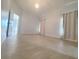 Bright bedroom featuring neutral walls, and tile floors at 283 Pine Arbor Dr, Orlando, FL 32825