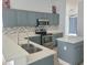 Modern kitchen with granite countertops, stainless steel appliances and stylish cabinets at 283 Pine Arbor Dr, Orlando, FL 32825