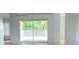 Living room area featuring access to the backyard via sliding glass doors at 283 Pine Arbor Dr, Orlando, FL 32825