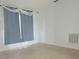 Bright living room with light tile flooring and ample natural light at 283 Pine Arbor Dr, Orlando, FL 32825