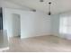 Bright living room with light tile flooring and chandelier lighting at 283 Pine Arbor Dr, Orlando, FL 32825