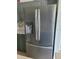 Modern stainless steel refrigerator with water dispenser complements kitchen design at 283 Pine Arbor Dr, Orlando, FL 32825