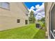 A spacious backyard perfect for relaxing and entertaining, with lake views at 2855 Club Cortile Cir, Kissimmee, FL 34746