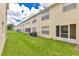 A well-maintained backyard offering ample space for outdoor activities and relaxation at 2855 Club Cortile Cir, Kissimmee, FL 34746
