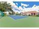 Enjoy a friendly match on the community tennis courts, surrounded by lush landscaping at 2855 Club Cortile Cir, Kissimmee, FL 34746