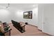 Enjoy movies in this theater room, which features theater seating and a projector at 2855 Club Cortile Cir, Kissimmee, FL 34746