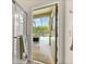 Bathroom featuring a shower stall with access to an outdoor screened patio at 305 Grand Reserve Dr, Davenport, FL 33837