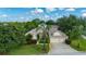 Charming single-Gathering home with lush landscaping and a two-car garage at 305 Grand Reserve Dr, Davenport, FL 33837