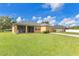 Well-maintained single-Gathering home with a screened patio and a spacious lawn at 3125 Grasmere View Pkwy, Kissimmee, FL 34746