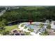 A wonderful single-Gathering home features mature landscaping, two-car garage, and fantastic access to nearby amenities at 336 Hollingshead Loop, Davenport, FL 33896