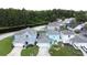 This gorgeous home is nestled in a serene setting, complemented by lush greenery, creating a peaceful retreat at 336 Hollingshead Loop, Davenport, FL 33896