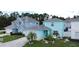 This beautifully landscaped two-story home boasts a well-manicured lawn, two-car garage and charming curb appeal at 336 Hollingshead Loop, Davenport, FL 33896