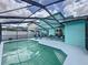 Beautiful screened-in pool and patio area ideal for relaxation and outdoor activities at 336 Hollingshead Loop, Davenport, FL 33896