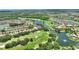 Beautiful aerial shot of a home in a golf course community near a lake at 346 Treviso Dr, Kissimmee, FL 34759