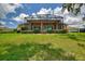 Spacious screened-in lanai and beautiful lawn are ideal for outdoor relaxation and entertaining at 346 Treviso Dr, Kissimmee, FL 34759