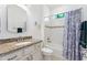 Cozy bathroom with granite countertops, tub, and shower at 346 Treviso Dr, Kissimmee, FL 34759