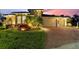 Beautiful home exterior with a well manicured lawn and lovely landscaping at 346 Treviso Dr, Kissimmee, FL 34759