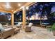 Spacious screened lanai featuring tile flooring, comfortable seating, and scenic water views at 346 Treviso Dr, Kissimmee, FL 34759
