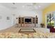 Bright living room with a view of a large TV and shelving at 346 Treviso Dr, Kissimmee, FL 34759