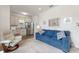 The comfortable living room with a kitchenette provides a cozy and convenient space for relaxation and entertainment at 346 Treviso Dr, Kissimmee, FL 34759