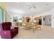 Living room with an open concept, combining the living area and dining room at 346 Treviso Dr, Kissimmee, FL 34759