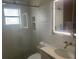 Contemporary bathroom featuring a glass-enclosed shower, vanity with marble countertop, and modern fixtures at 3715 Sarasota Ct, Orlando, FL 32812