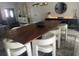 Stylish dining room with an elegant wooden table and contemporary decor at 3715 Sarasota Ct, Orlando, FL 32812