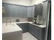 Modern kitchen with grey cabinets, stainless steel appliances and tile backsplash at 3715 Sarasota Ct, Orlando, FL 32812