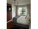 Comfortable main bedroom with natural light from the window seat at 3715 Sarasota Ct, Orlando, FL 32812