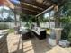 Cozy outdoor patio space with comfortable seating, perfect for relaxing and entertaining at 3715 Sarasota Ct, Orlando, FL 32812